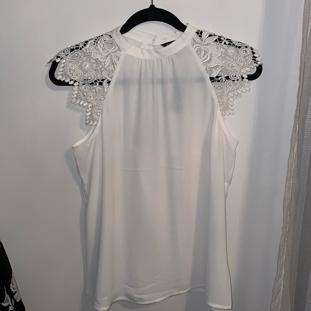 White sleevess top